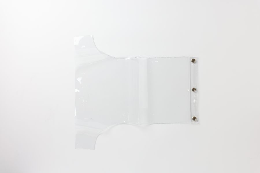 専用形状で製作した、機械用パーツ（スナップボタン付き加工品）